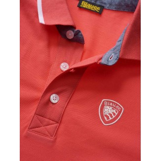 POLO BLAUER CON BORDI RIGATI IN CORALLO